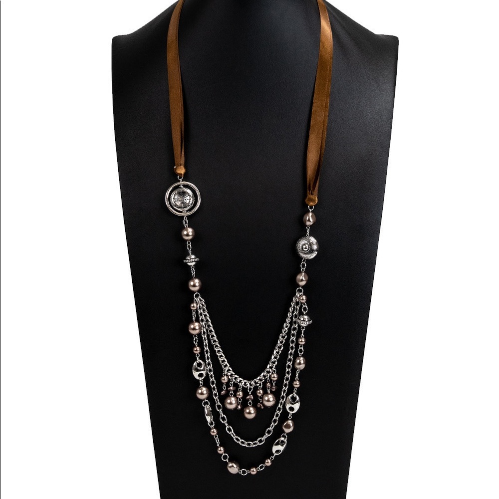 COPY - NWT A silky brown ribbon replaces a traditional chain to give an elegant…